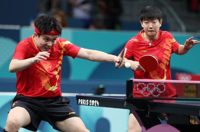 1722394549667032161.jpg 巴黎奥运会_乒乓球——混双:王楚钦_孙颖莎晋级八强+XxjpseC007441_20240728_MVPFN0A001.jpg